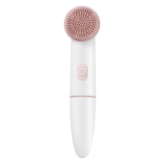 White and pink facial cleansing brush on a white background