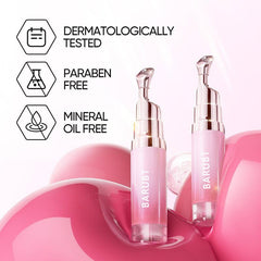 Two pink skincare bottles with certification icons on a pink background