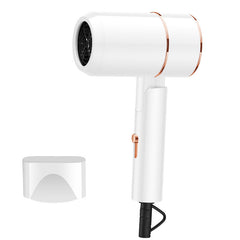 White hair dryer with rose gold accents on a white background