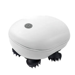 A white oval-shaped handheld scalp massager with black silicone bristles and a gray power button on top, shown against a plain white background.